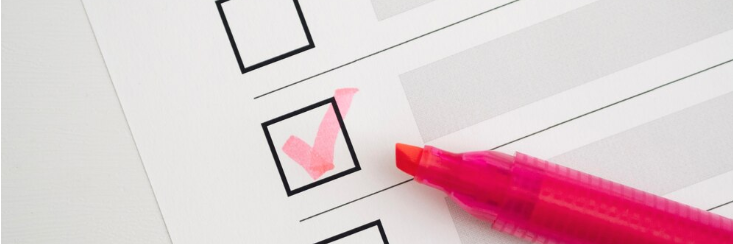 Et papir med afkrydsningsbokse på. Der er krydset af i en af de fire bokse.