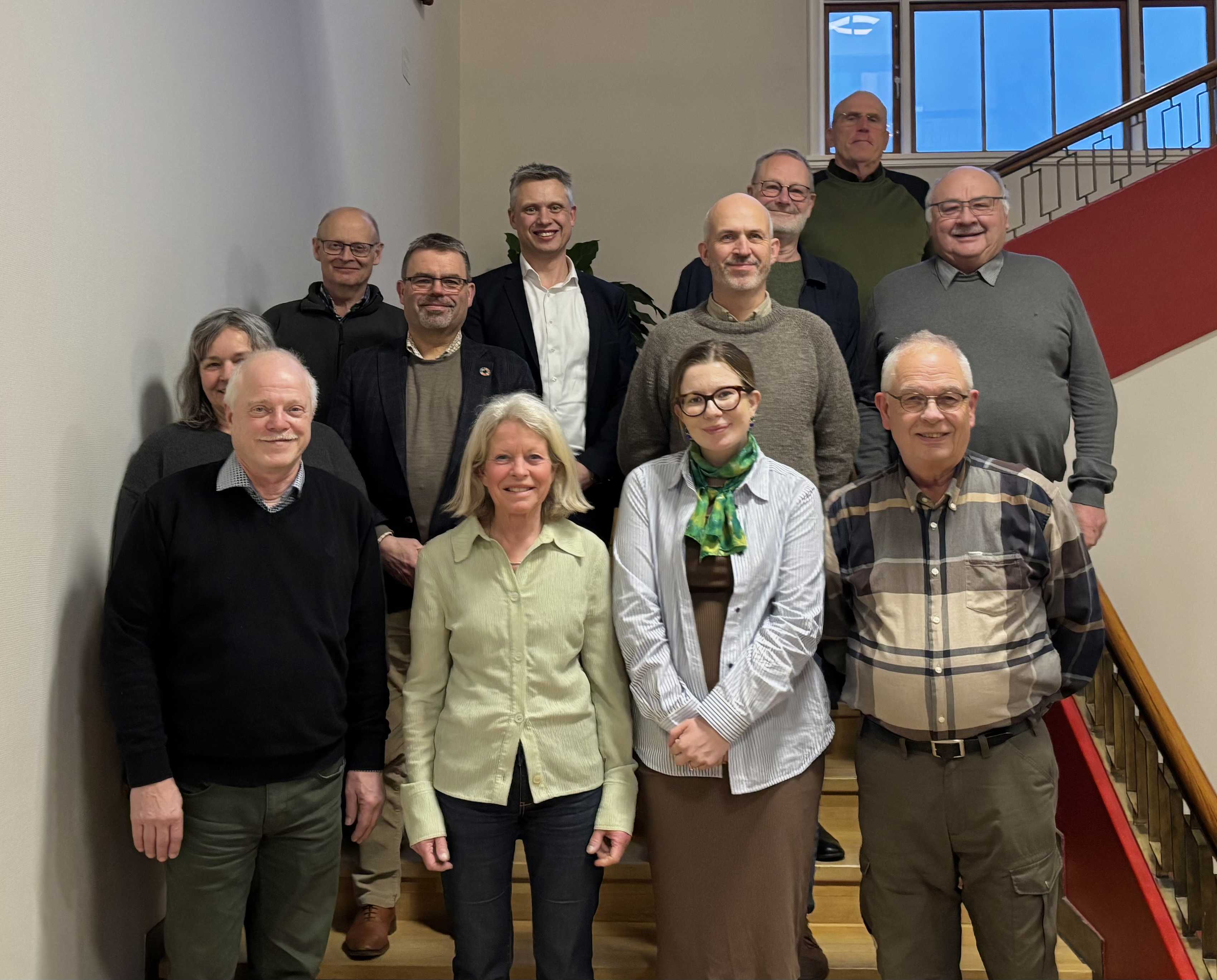 Fællesfoto af medlemmerne af den lokale trepart