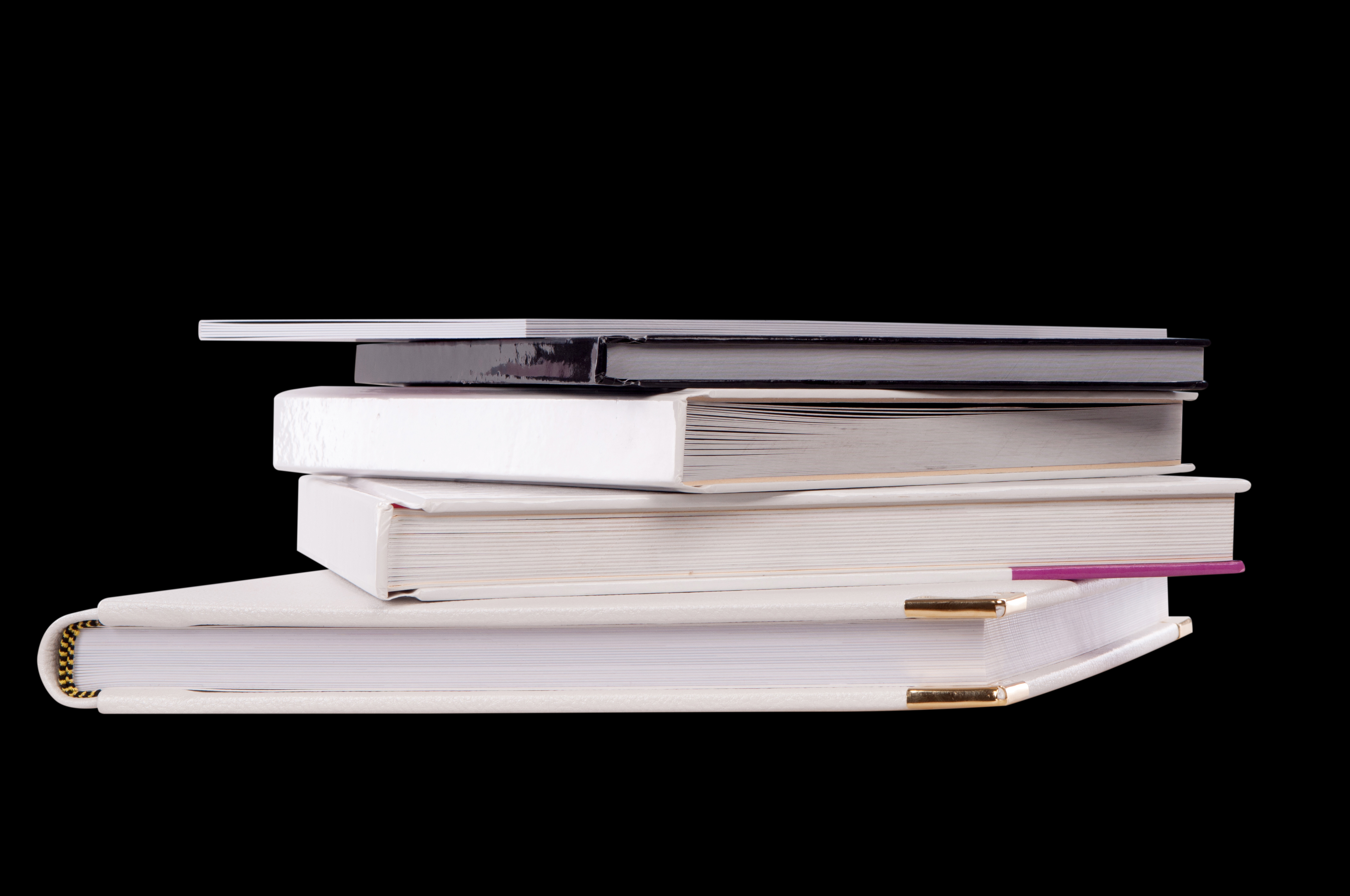 5 bøger ovenpå hinanden