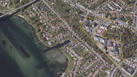 Lokalplan 696: Lokalplanområdet vist med gul markering på skråfoto.
